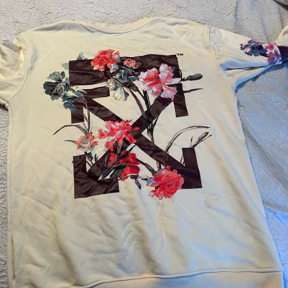 I am selling this off-white sweater